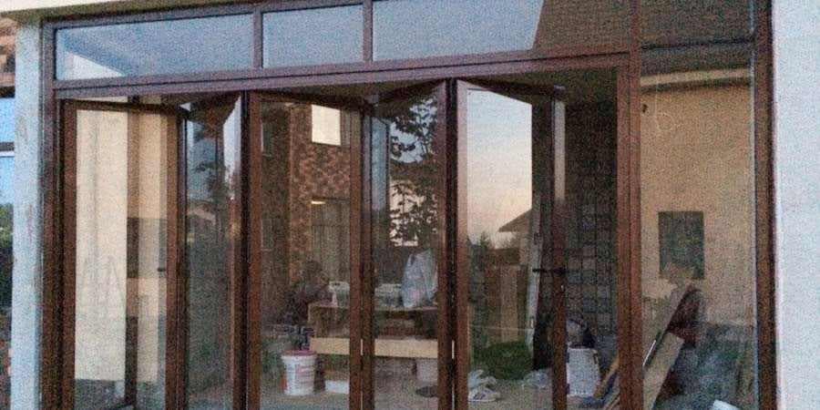 Алюминиевые окна гармошкой для веранды и террасы 