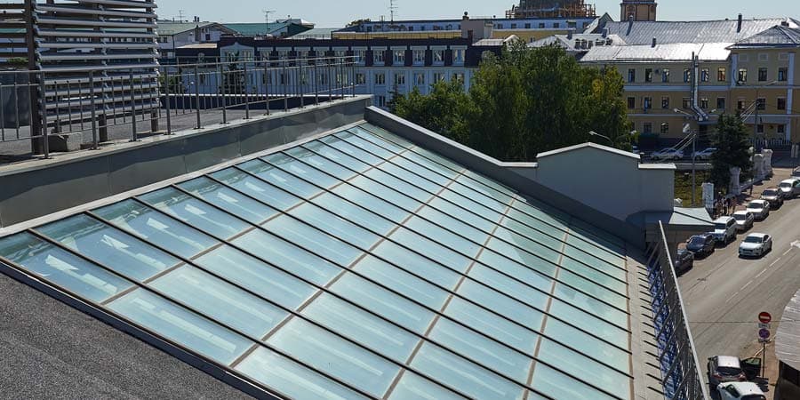 Односкатные стеклянные крыши - зенитные фонари